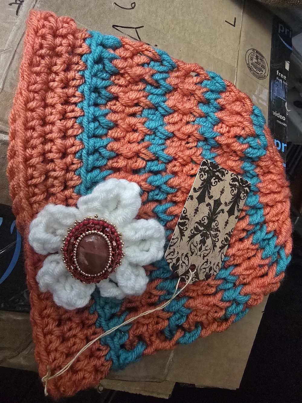 Handmade Orange & Teal Crochet Beanie with White Flower Accent